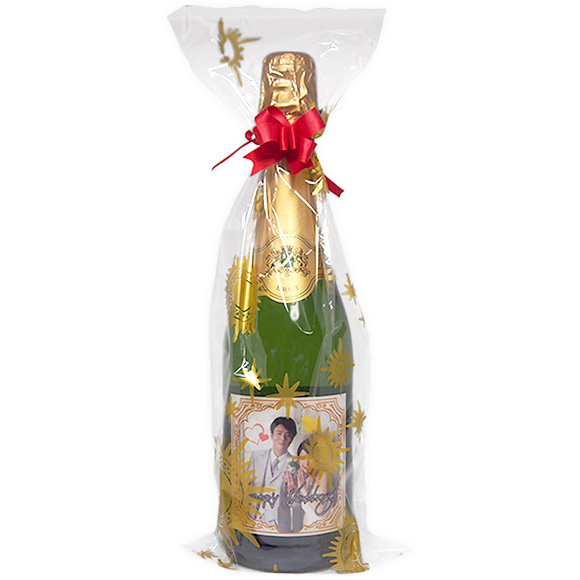 スナップシャンパンのボトルフィルムとリボンによる無料ギフトラッピング